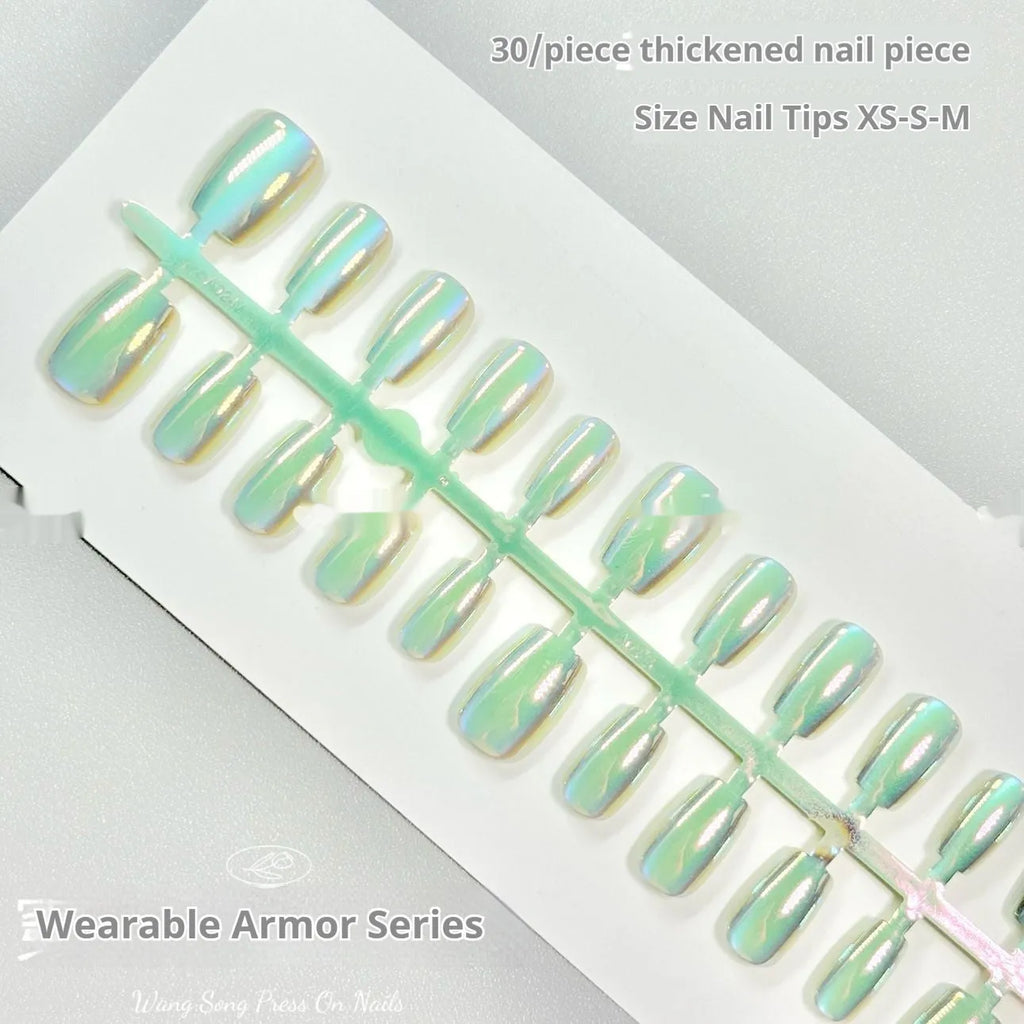Electroplating Cat's Eye 02 Idle Court false nails with Aurora effect in short ladder sizes on a hand.