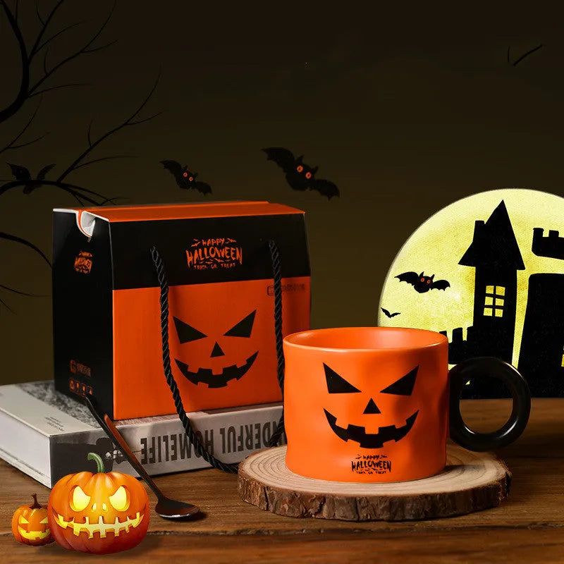 Orange ceramic Halloween pumpkin mug with handle and gift box.