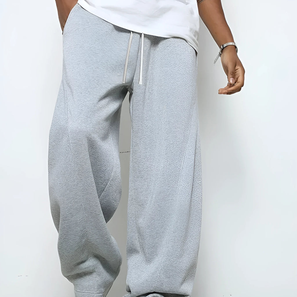 Men's casual polyester trousers with elastic waistband in straight leg design