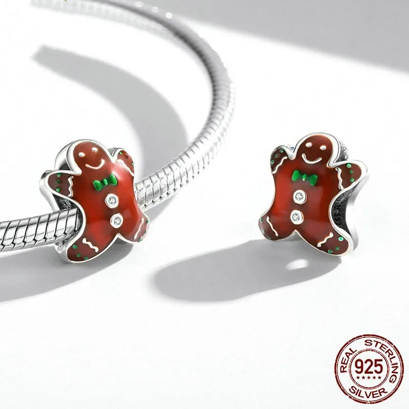 Christmas gingerbread man 925 sterling silver bead with dripping oil finish, 1.2cm height, 0.5cm aperture, on white background