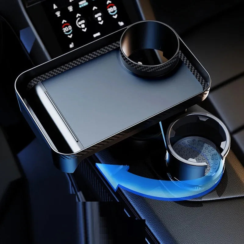Black rotating car dinner tray holder mounted in a vehicle cup holder.