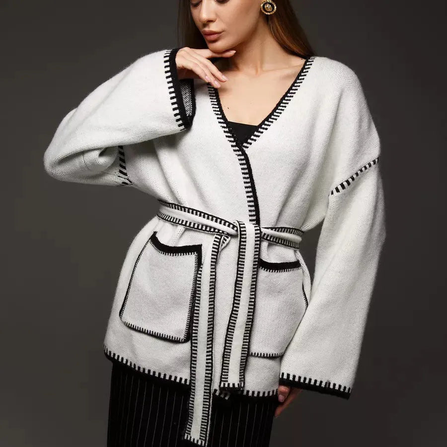 Loose fit lace-up front knitted cardigan in black, camel, or white colours.