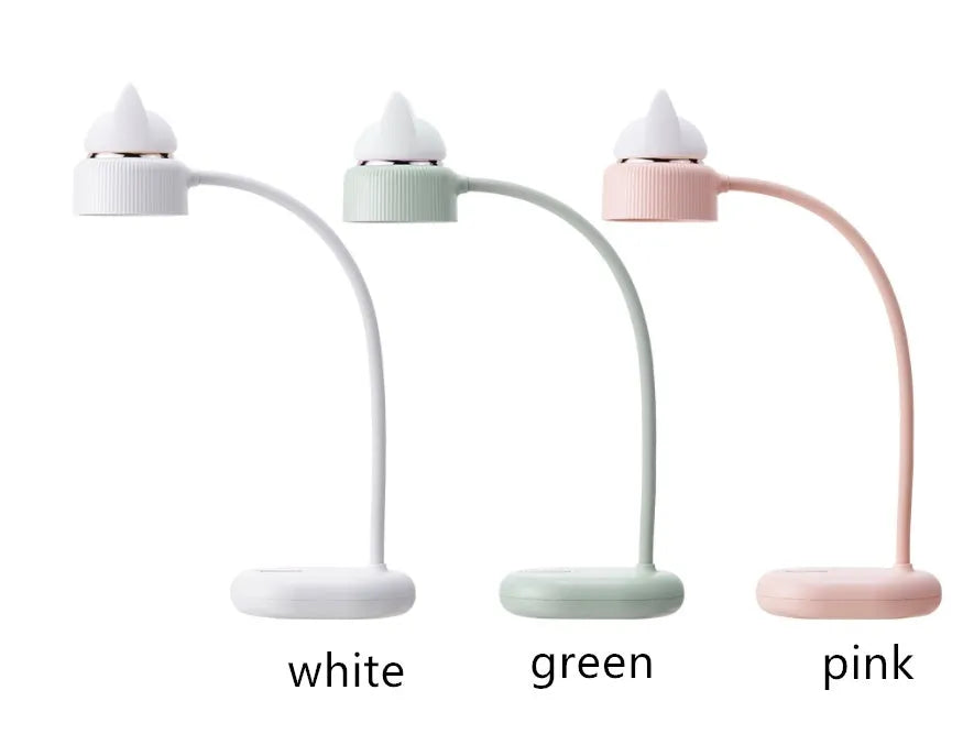 White rechargeable LED clip desk lamp with touch control on wooden desk