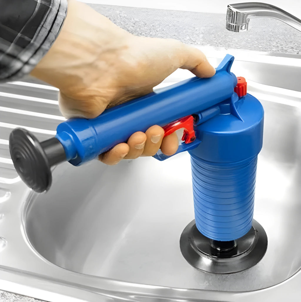 Plastic high-pressure drain blaster gun with four different-sized suction cup adaptors for unblocking pipes