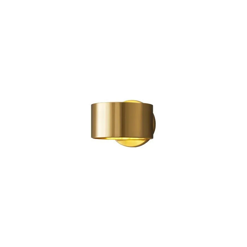 Modern simple copper wall lamp shown in gold and black finishes for living room use.