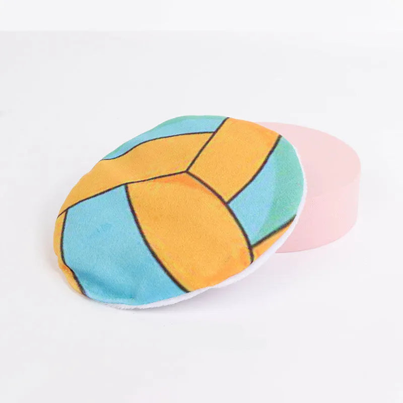 Interactive plush flying disc cat toy with sports ball pattern, containing catnip and crinkle sound.