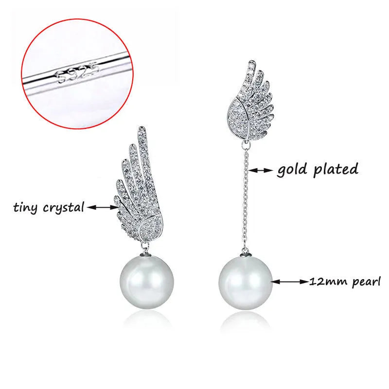 Silver angel wing earrings with diamond treatment and gold-plated gemstone inlay in platinum colour