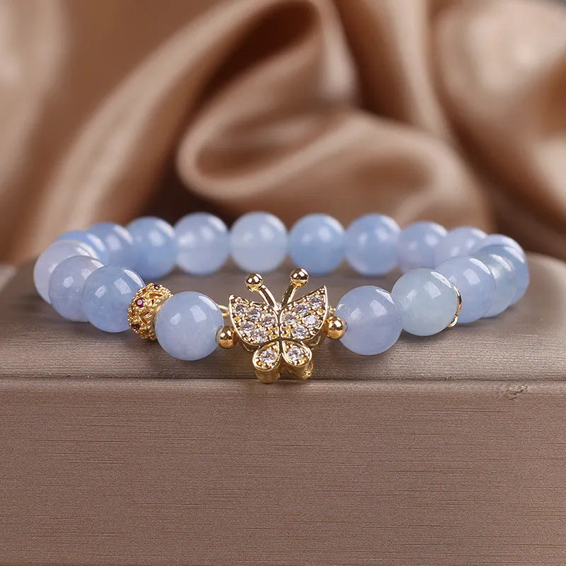Sky blue aquamarine butterfly crystal bracelet with pearls and rhinestones measuring 17cm length