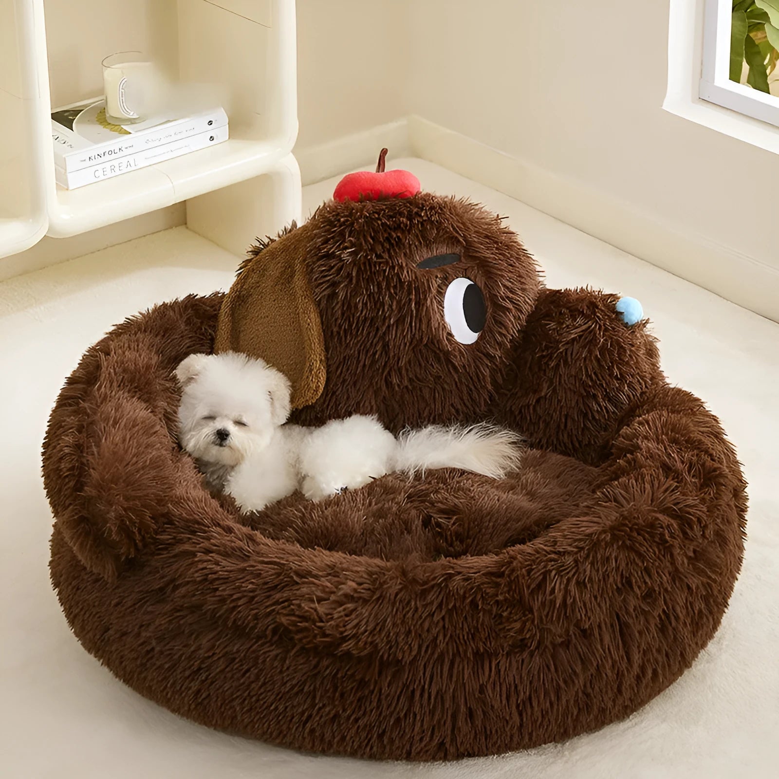 Plush grey sofa bed for small dogs and cats with raised bolsters, shown in medium and large sizes.