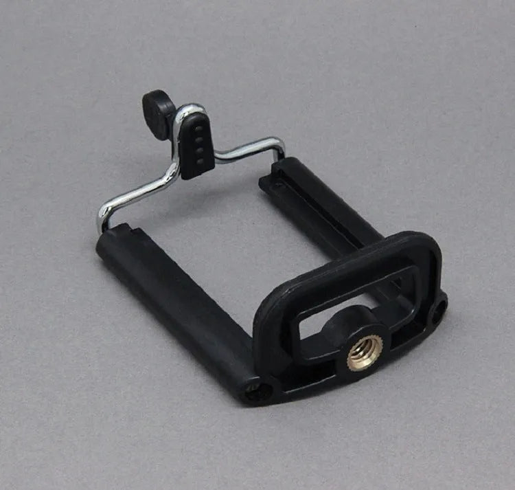 Black octopus tripod stand with flexible rubber legs and a spherical gimbal head for cameras and phones.