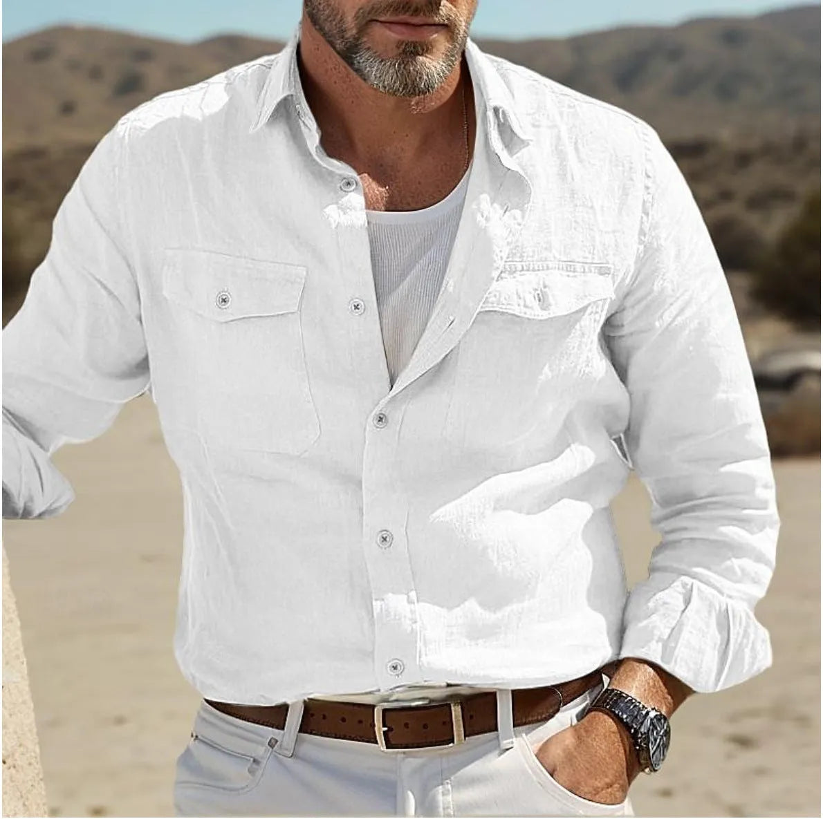Men's loose-fit long-sleeved cotton shirt in solid green colour.