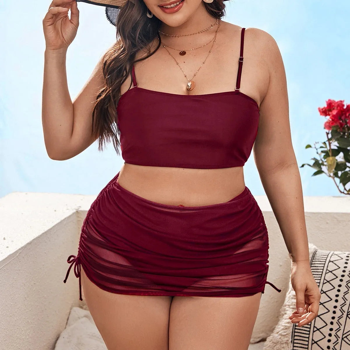 Women's solid colour mesh bikini three-piece set showing top, underwear, and apron on a mannequin.
