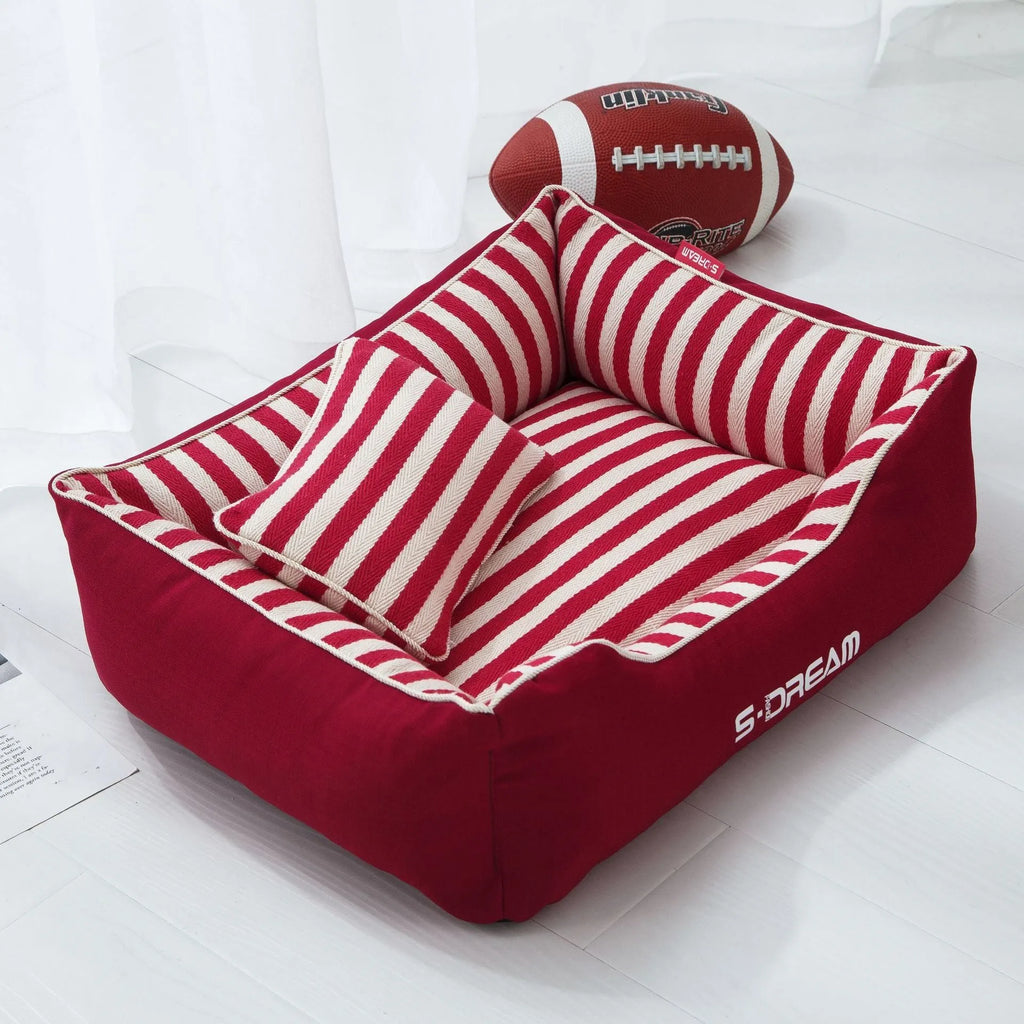 Navy stripes dog kennel mat and fabric pillow set in blue or red, shown in multiple sizes