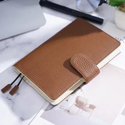 Lychee pattern cowhide leather notebook in A6 size with loose-leaf binding
