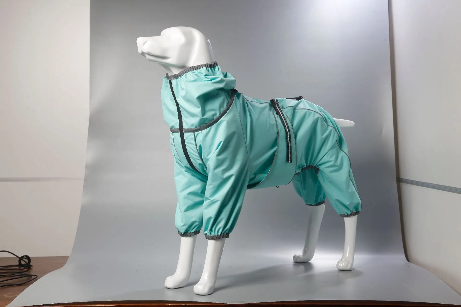 Dog wearing red cotton-padded shell jacket with sports style design