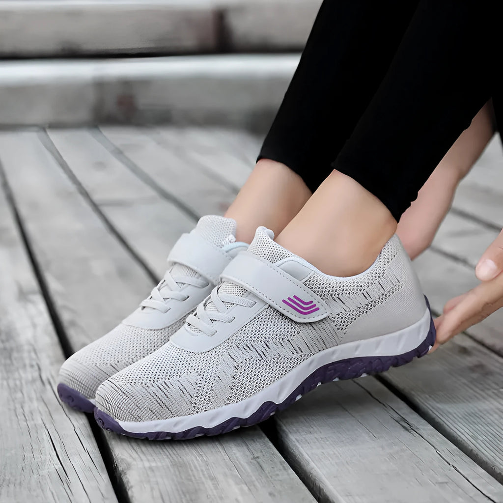 Women's low-top grey purple wedge heel casual shoes with velcro strap on soft mesh upper.