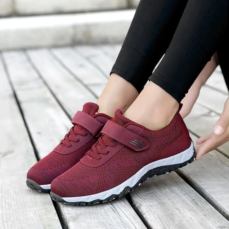 Women's low-top grey purple wedge heel casual shoes with velcro strap on soft mesh upper.