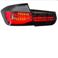 BMW 3 Series modified LED tail light assembly in red or black smoke finish, showing streamer running light design.