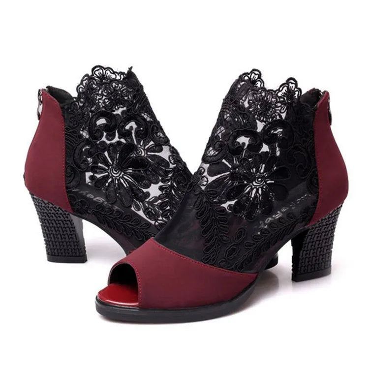 Black floral lace gladiator sandals with square high heel and peep toe design