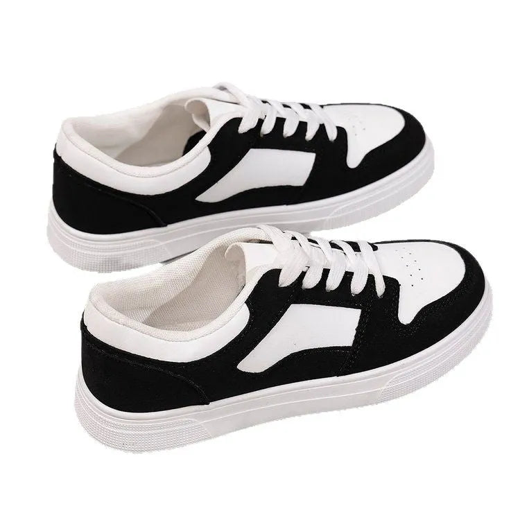 Black women's low-top casual sports shoes with a rubber sole and round toe.