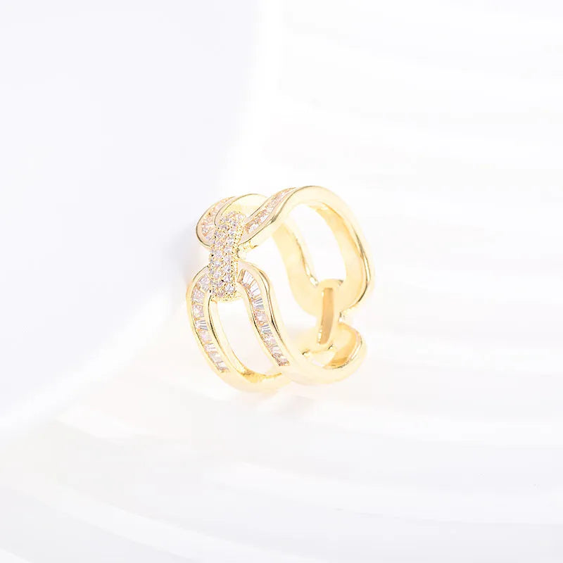 Round copper scarf ring with gold electroplated finish and geometric shape for securing scarves