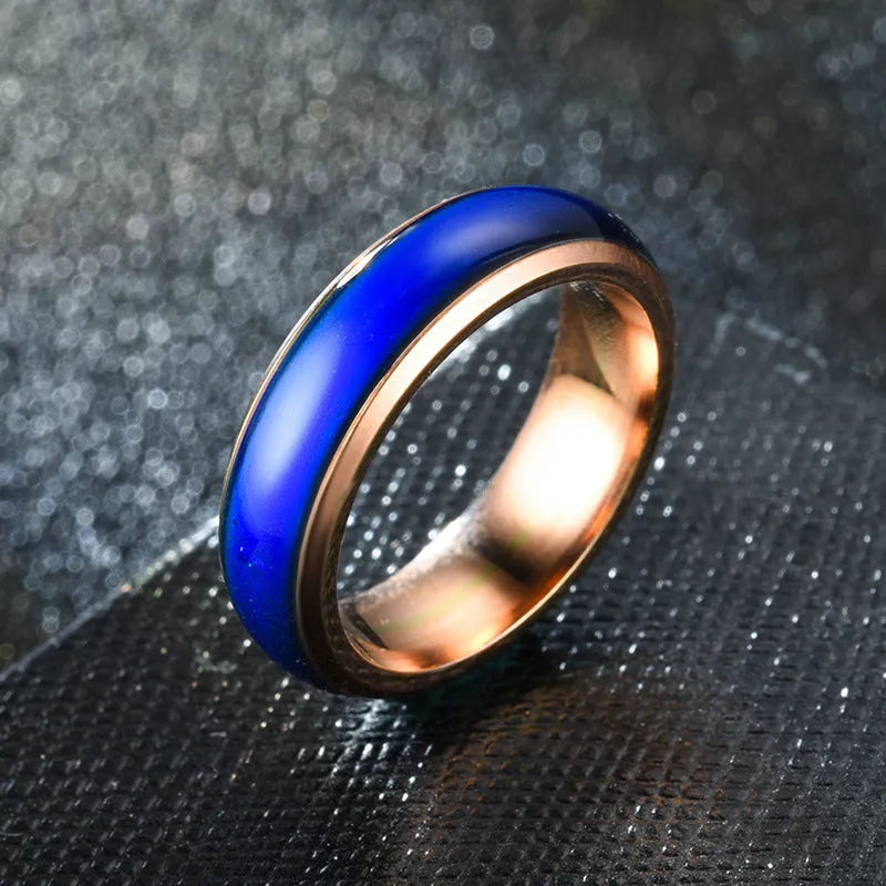 Colour changing mood ring in alloy with temperature-sensitive coating, available in black, gold, multicolor, rose gold, silver