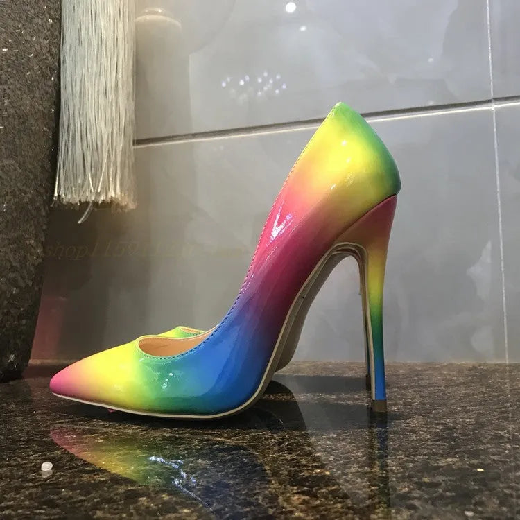 Rainbow multicolour patent leather women's stiletto heels with a pointed toe.