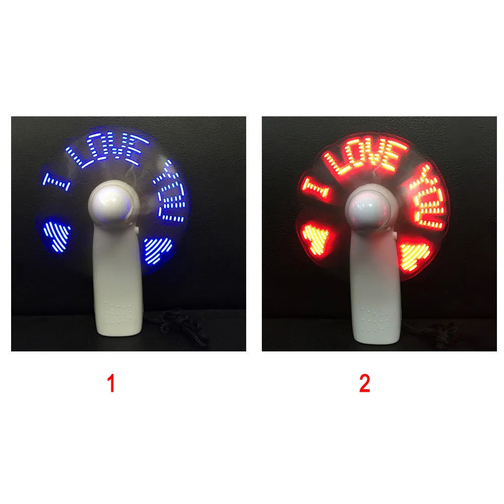 White handheld mini fan with blue and red LED love pattern flashing on its front