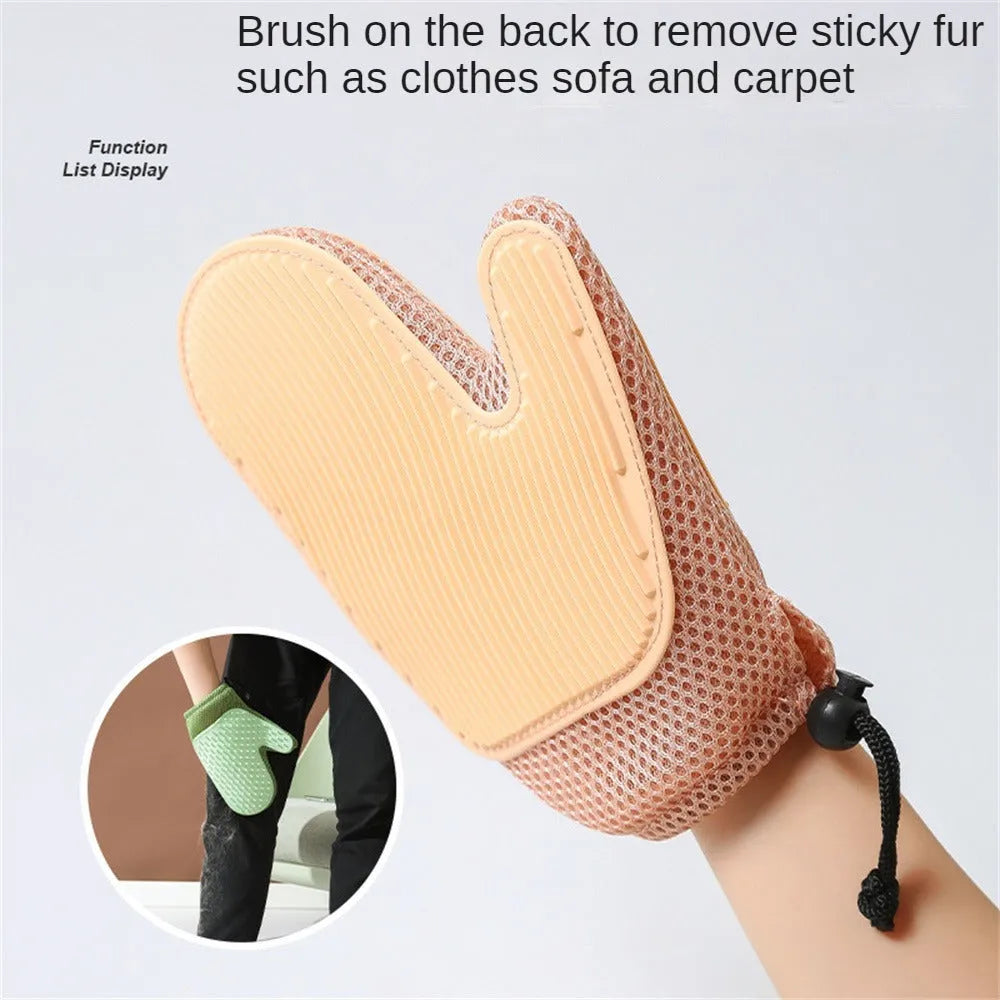 Dark blue mesh and TPR pet grooming glove for removing cat and dog hair from pets and fabrics.