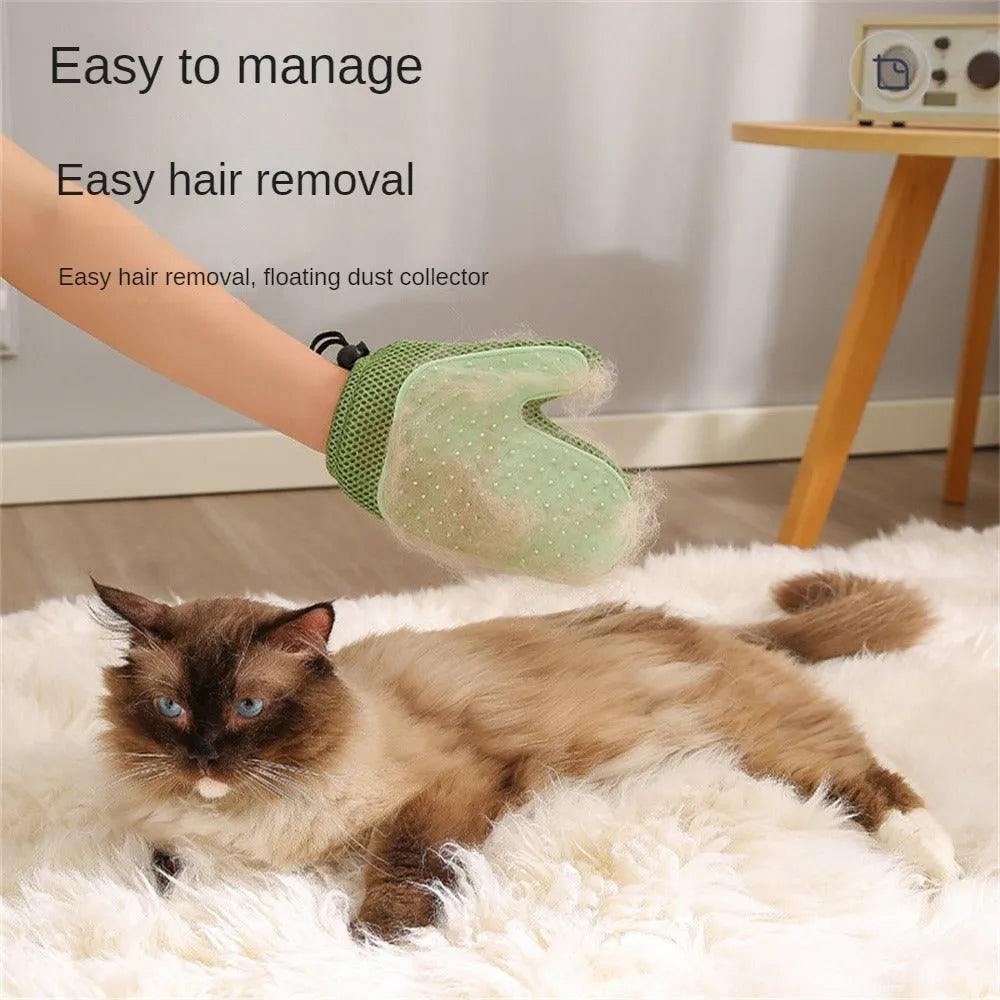 Dark blue mesh and TPR pet grooming glove for removing cat and dog hair from pets and fabrics.
