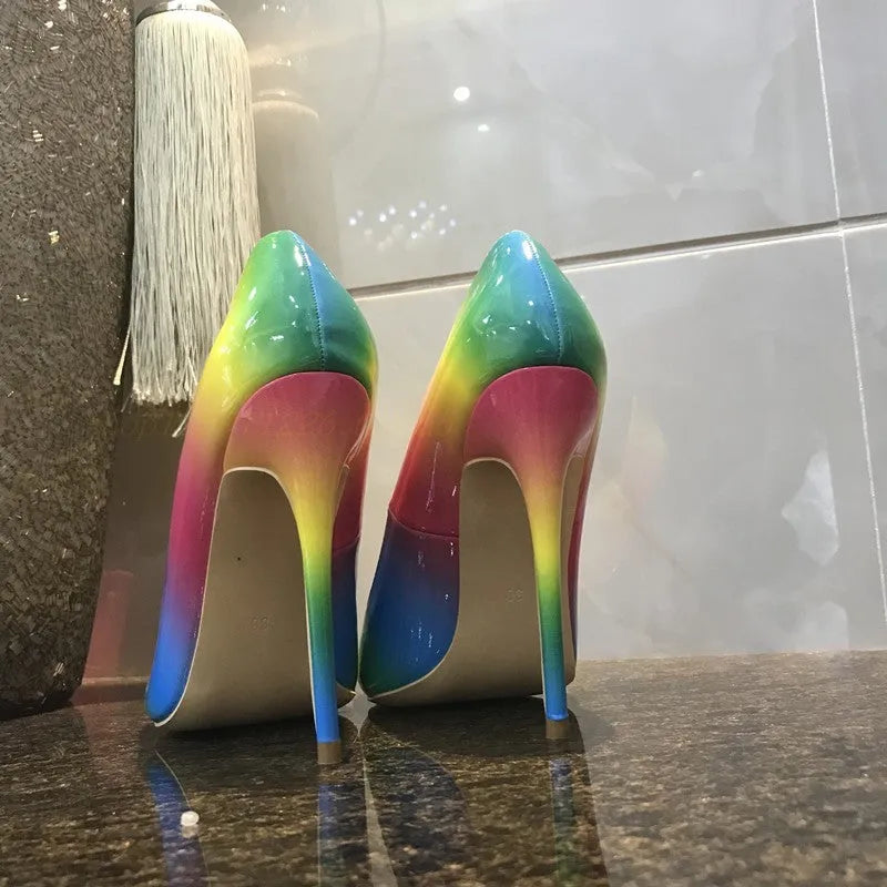 Rainbow multicolour patent leather women's stiletto heels with a pointed toe.