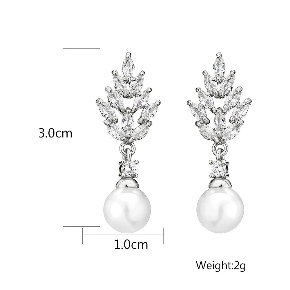 Geometric flower shape stud earrings with micro inlaid zircon stones in gold, rose gold, or white gold plating.
