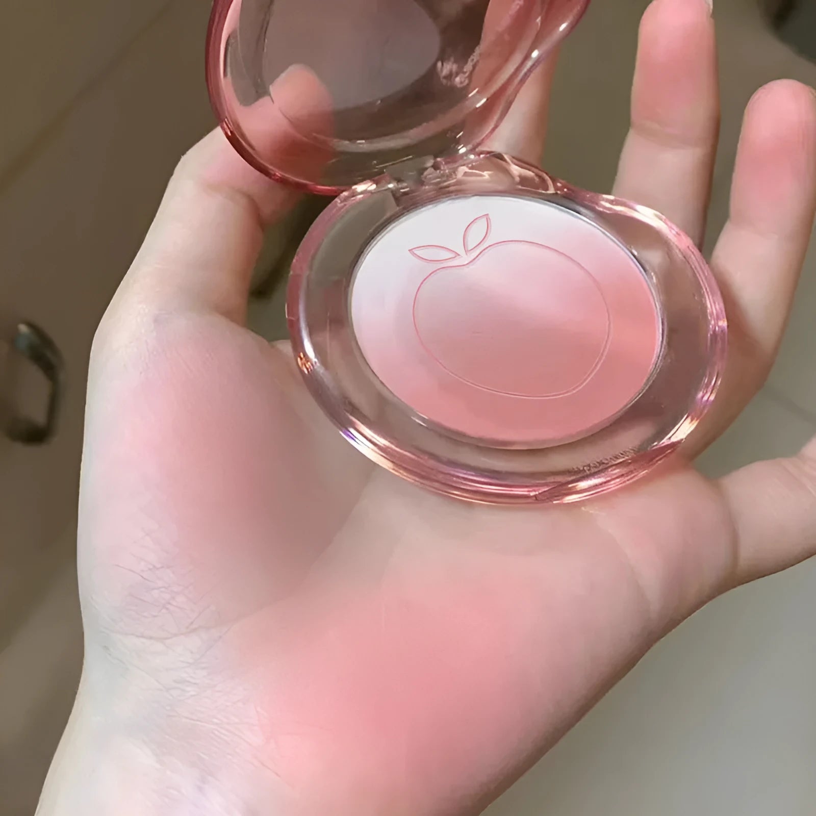 Matte finish powder blusher compact showing gradient colour design