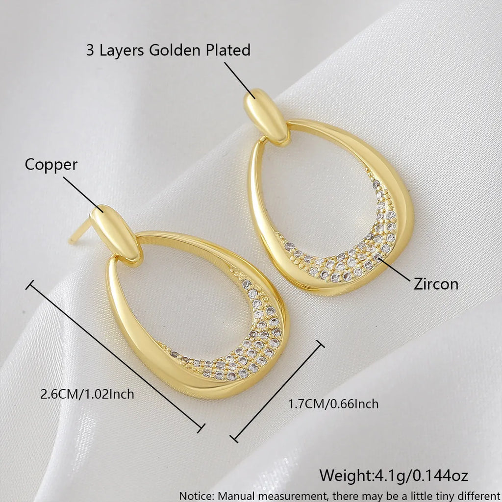 Yellow gold geometric drop earrings for women, showing 2.6x1.7cm size.