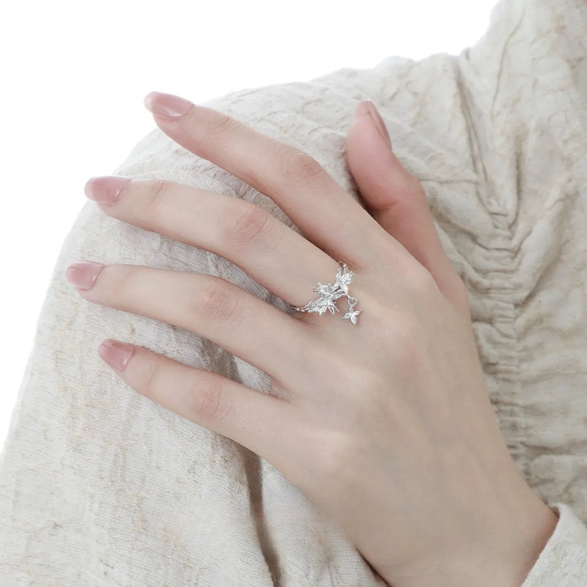 Adjustable silver butterfly ring with electroplated gold finish