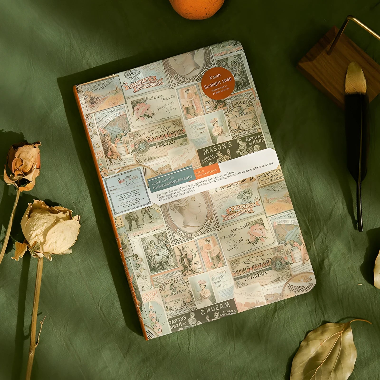 A5 kraft paper mood notebook with retro illustration cover in blue, coffee, or red, showing coloured pages.