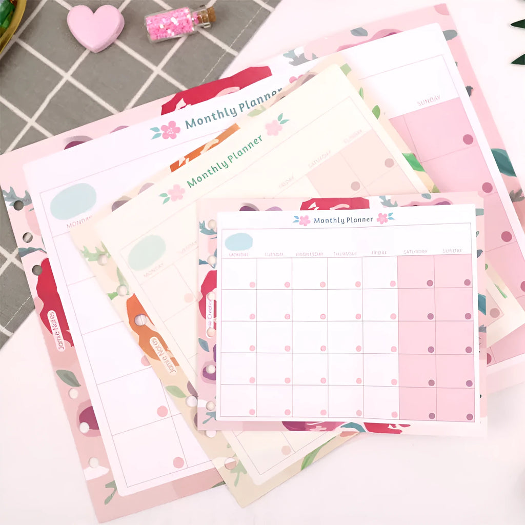 Handbook loose-leaf refill sheets showing floral monthly planner and symphony tri-fold layouts in A5, A6, A7 sizes