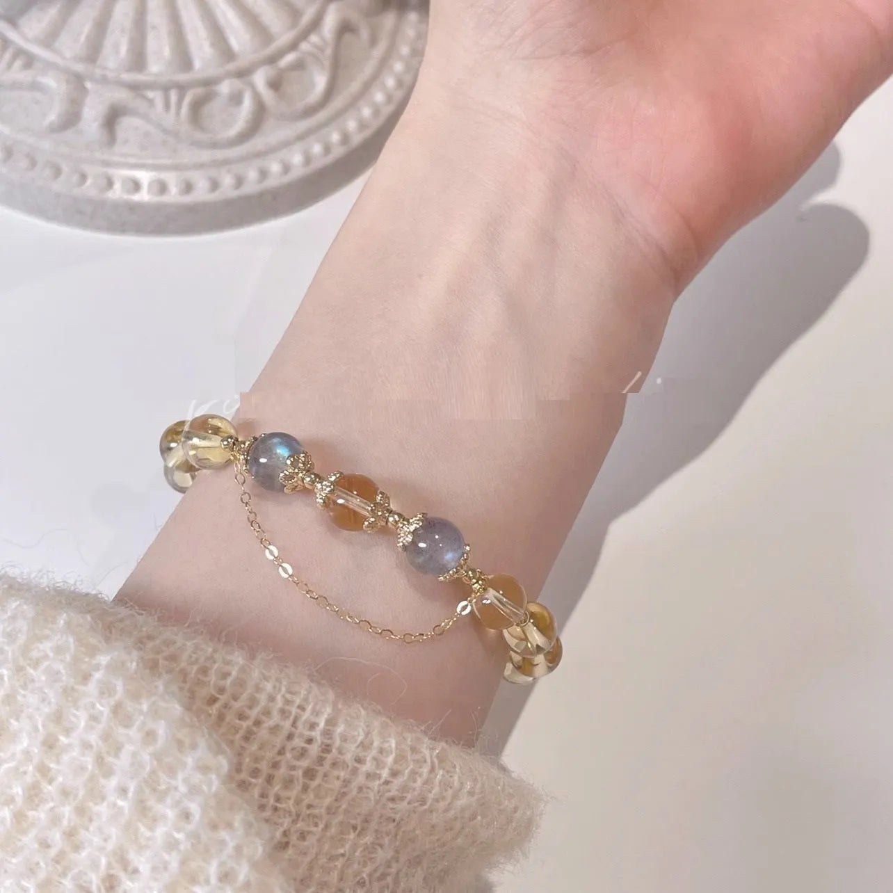 Chinese style women's crystal bracelet with 14K gold electroplating, moonstone, and golden sun stone fortune crystal design