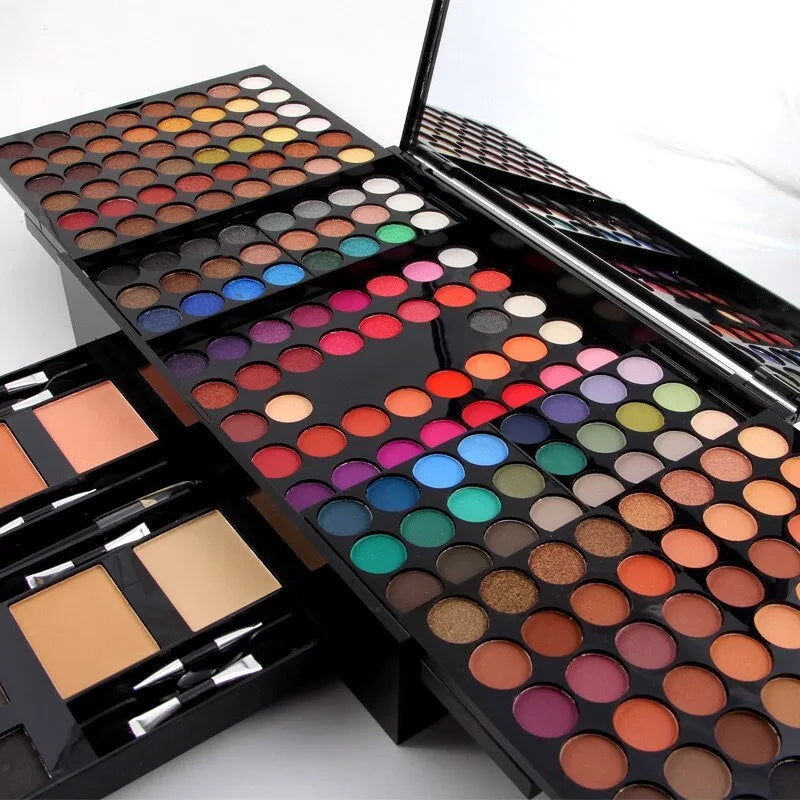 Piano-shaped makeup palette open to show 180 eyeshadows, 2 blushes, and 8 contour powders