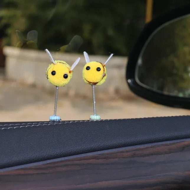 Cartoon bee car decoration with furry texture and swing spring on car dashboard