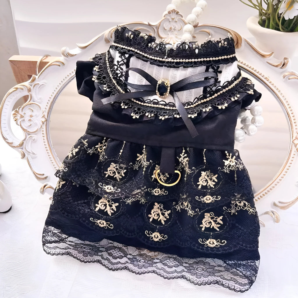 Golden gothic princess style skirt dress for a small dog on a mannequin, showing the skirted design.