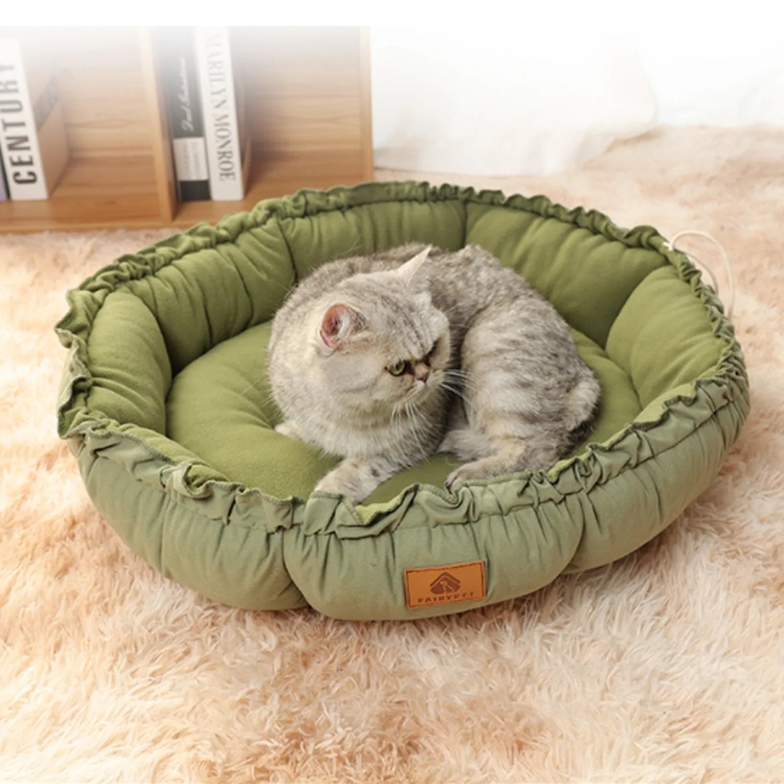 Grey reversible donut pet bed with raised rim for cats and small dogs