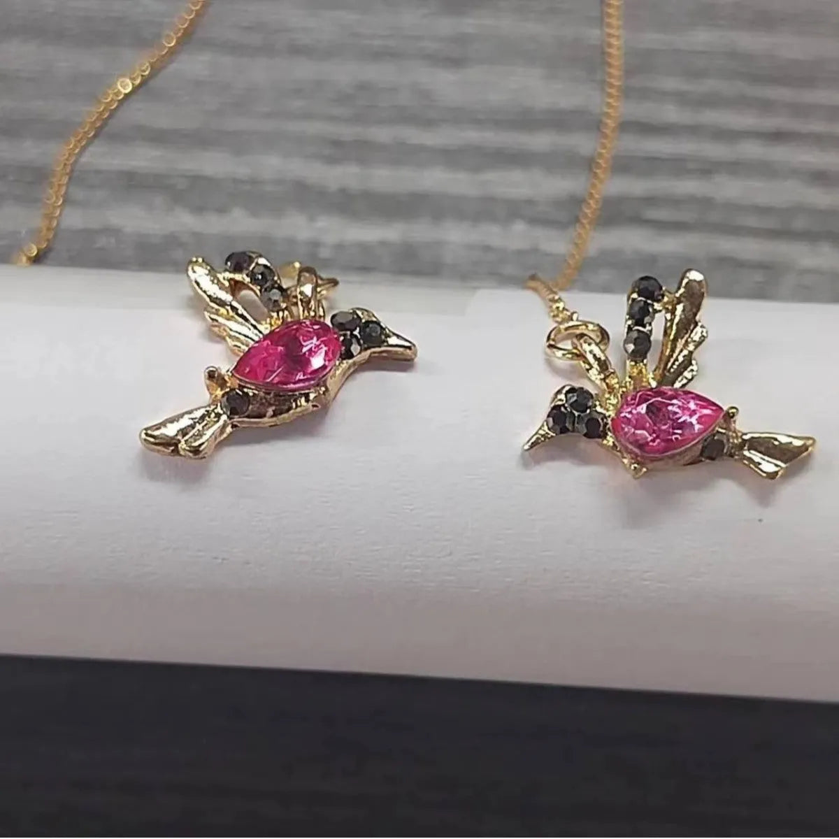 Personalised long drop earrings with bird charm and zirconium wing accents in electroplated colours