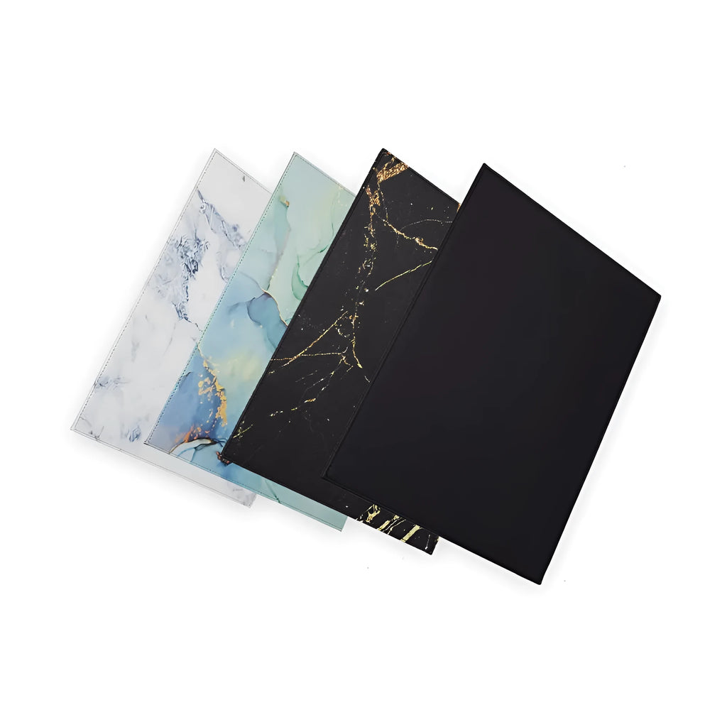 Anti-radiation printing tablet pad in black, gold, blue, and green colour options on a desk.