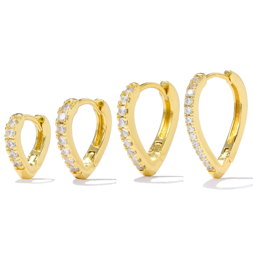 Geometric heart-shaped copper ear clip with electroplated gold finish for women.