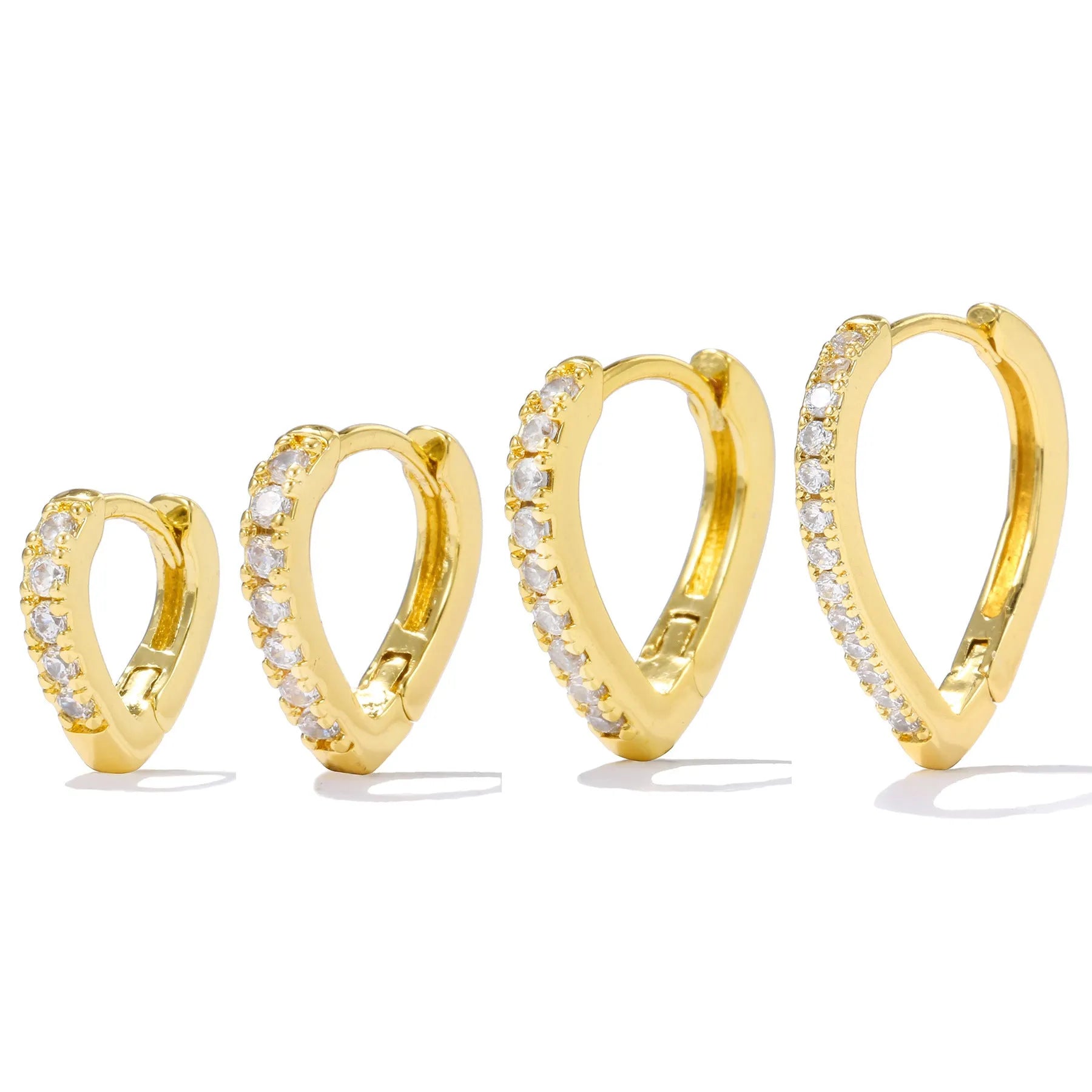 Geometric heart-shaped copper ear clip with electroplated gold finish for women.