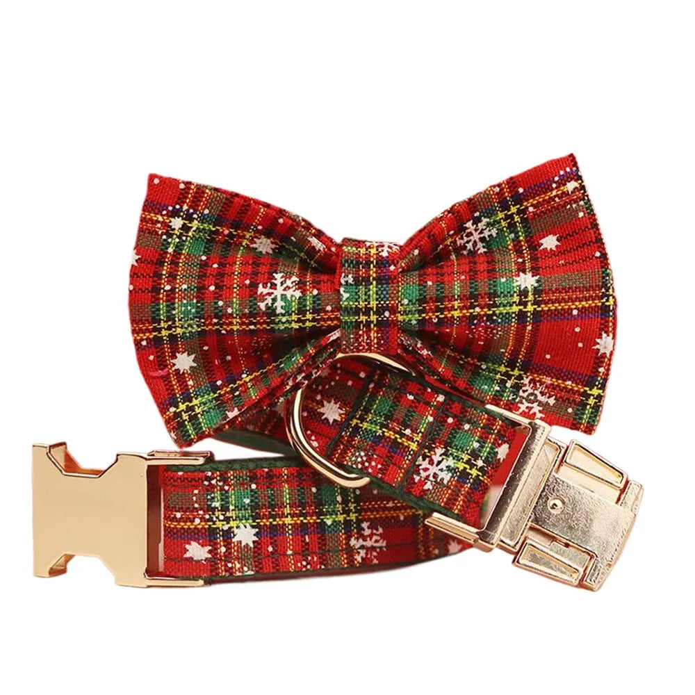 Christmas pet collar four-piece set with green background snowflake design showing dog collar, leash, vest and matching bow