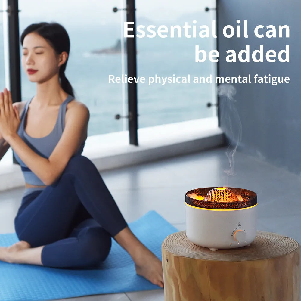 White volcano-shaped humidifier and essential oil diffuser with orange and blue simulated flame light effect.
