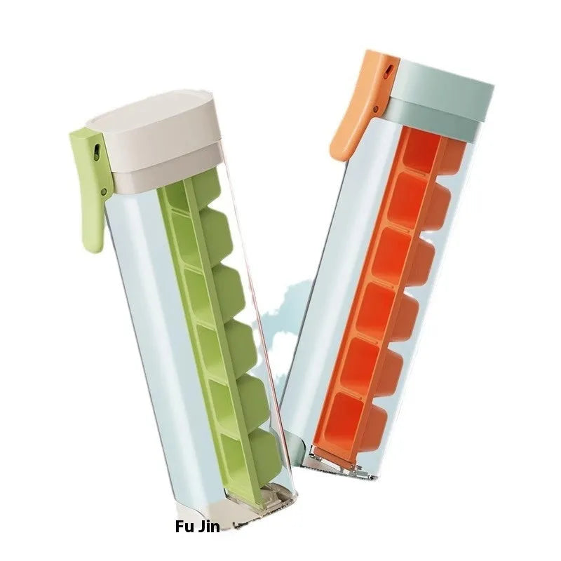 Food-grade ice cube mould with one-press release mechanism and storage box in kitchen setting