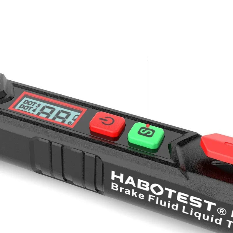 Digital display brake fluid tester pen with LCD screen on a workbench.